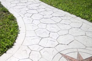 Printed grey concrete path compass