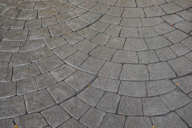 Stamped concrete pavement cobblestones pattern, decorative textures of paving cobblestones tile on cement flooring